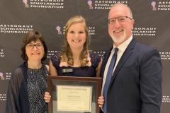 Katelyn Kirchner, center, poses with her parents Theresa and Robert Kirchner